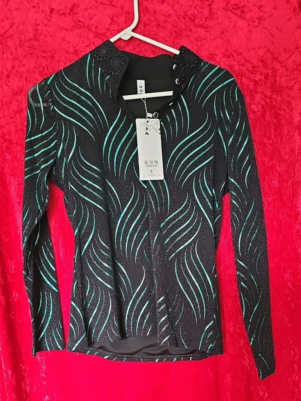 Black Long-Sleeve Knit Top with Teal Wave Detail